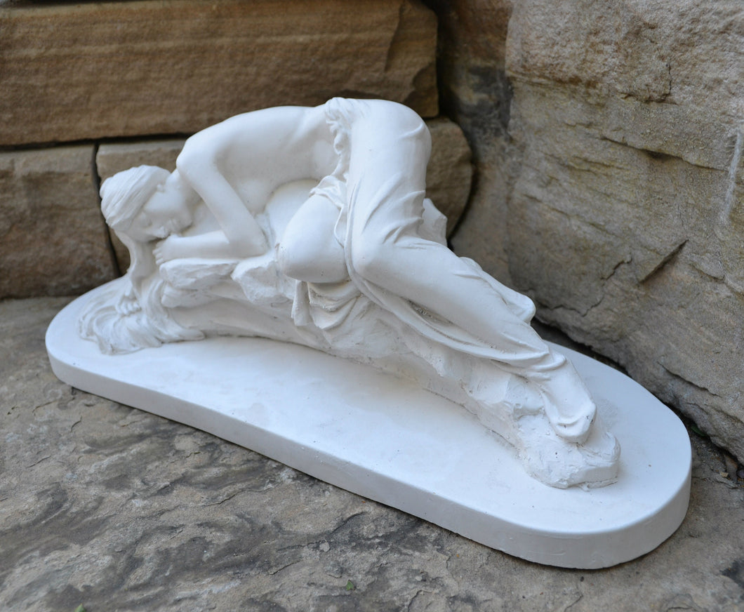 Decor Lady laying on rocks www.Neo-Mfg.com